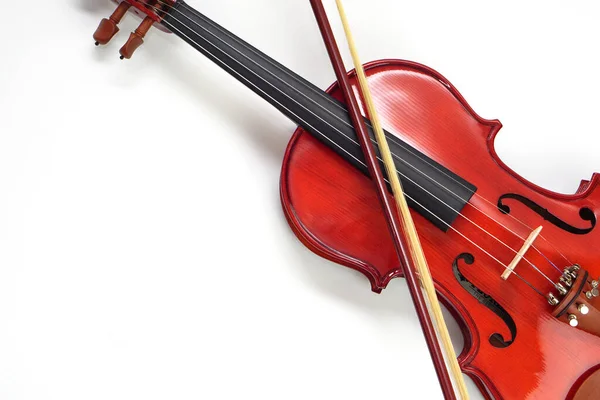 Close up of Violin Against on white background with copy space. Instrument and musical concept.