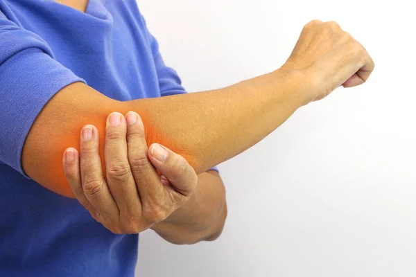 Stock image Woman suffering from elbow pain on white background. Healthcare and office syndrome concept.