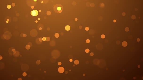 抽象的な背景に浮かぶ金色の光沢のある粒子 ゆっくりと飛ぶボケ粒子 — ストック動画