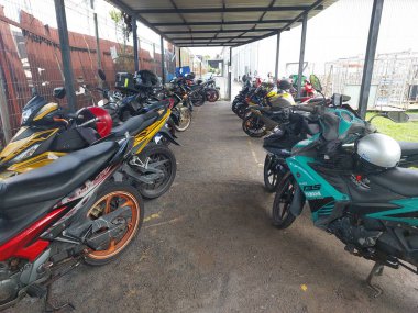 Selangor, Malaysia - June 07th 2024 : Parking Motorcyle  clipart