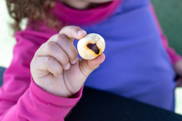 Child playing outside, good activity and sport for health and mental health