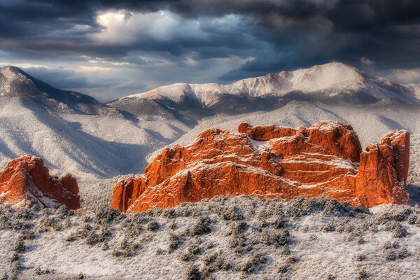 Pikes Peak watches over the Garden of the Gods in Colorado Springs, Colorado.