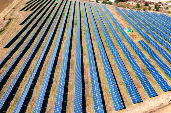 stock image Aerial top view from drone of a field of solar panels