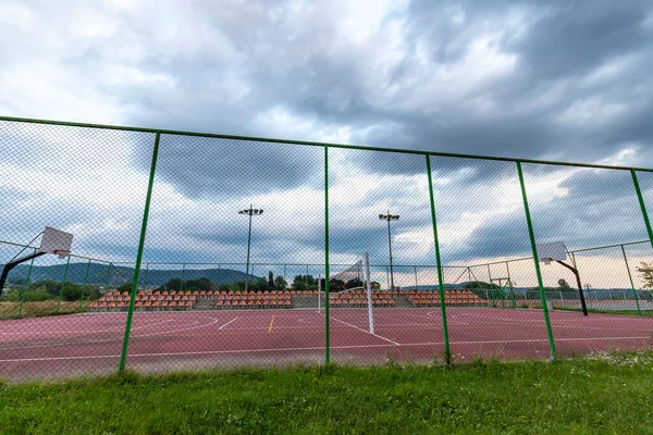 stock image Sports ground in the city, public basketball and football court