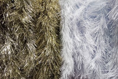 Çeşitli beyaz ve altın çelenklerde şenlik arka planı