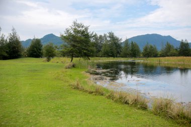 lake decorated with mountains in the aceh area