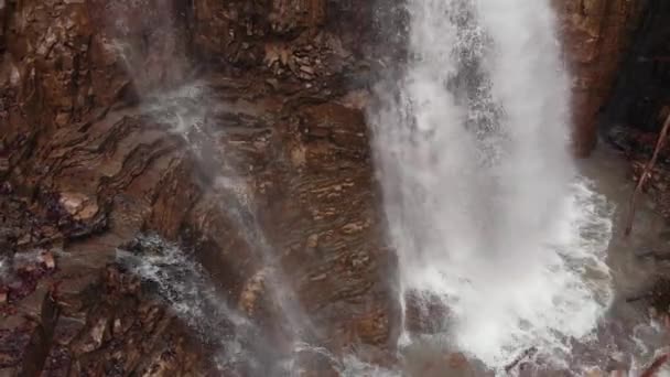 Aerial Drone Flies Water Drops Rocky Cliff Depicting Small Human — Stock Video