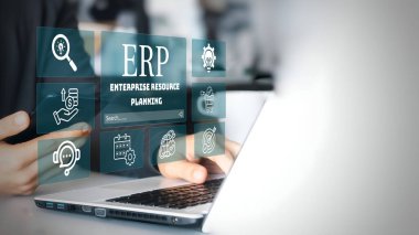 A business person using laptop with visual screen ERP, Enterprise resource planning concept.