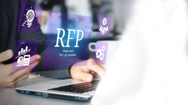 A business person using laptop with visual screen on Request for Proposal (RFP) concept.