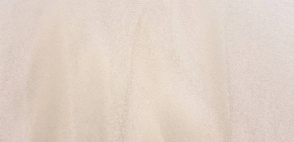 ビーチの砂を背景や壁紙として — ストック写真