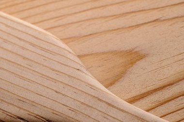 Kumlu ahşap zımbırtı, ahşap zemin üzerine kurulmuş. Sandy Arkaplanındaki Desenli Görüntü.