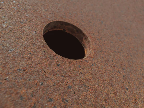 Makroaufnahme Eines Korrodierten Eisenblechs Mit Einem Loch Kann Als Metapher — Stockfoto