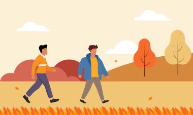 Sonbaharda, sonbahar kıyafetleriyle rahatça yürüyen bir adam.