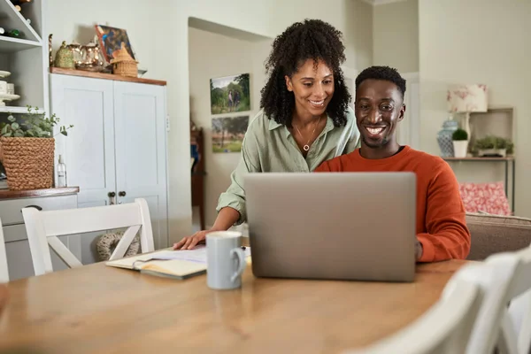 Smiling Young Multiracial Couple Checking Household Budget Online Banking Dining — Stockfoto