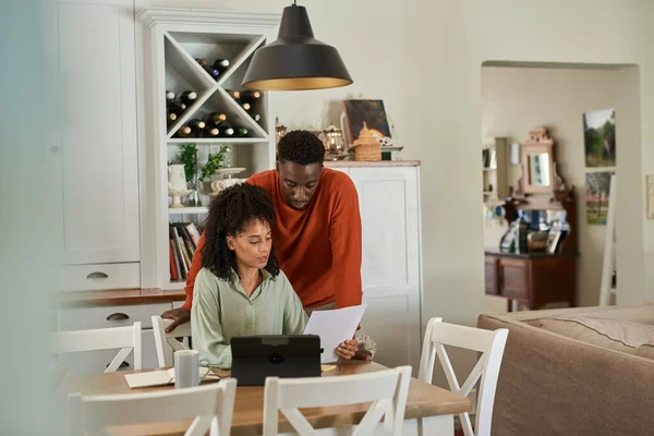 Young Multiracial Couple Paying Bills While Doing Online Banking Laptop — Stock Photo, Image