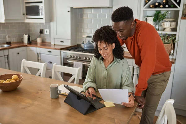 Smiling Young Multiracial Couple Paying Bills While Doing Online Banking — Stock Photo, Image
