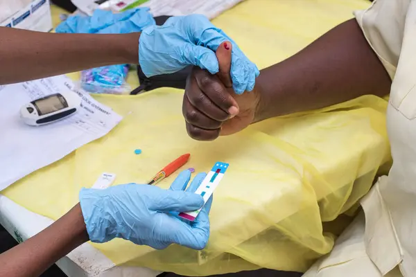 stock image Medical personnel take blood samples during a medical outreach organized by the Lagos Island Local Government Chairman. Lagos Nigeria on February 17, 2022.  