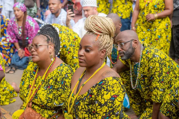 stock image Foreigners from Brazil, the USA, and the United Kingdom pay homage to the custodian of Culture during the annual Osun Osogbo Festival held in Osogbo, the capital city of Osun, Nigeria - West Africa on August 9 2024