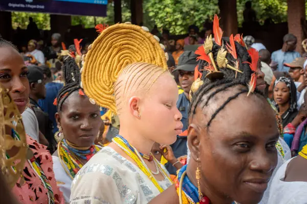 stock image Iya Osun, Aworo Osun and Akuko Osun styled in Agogo hairstyle pay homage to the Ataoja of Osogbo during the annual Osun Osogbo Festival held in Osun State, Nigeria - West of Africa on Friday, August 9 2024