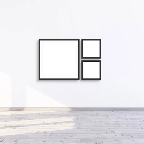 3个正方形框架挂在有阳光的白墙上 3个框架挂在画廊墙上 3D渲染插图 图库照片