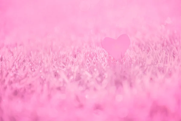 Heart Pink pastel blurred background for love valentine\'s day concept. Rose pink color effect glitter. Backdrop abstract blurry bokeh festive. Soft sparkle on blurry Background pastel colored.