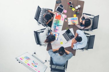 Top view business people meeting together at office desk in conference room. Team business meeting partnership planning brainstorming together. Team Collaborate group of partner company brainstorming