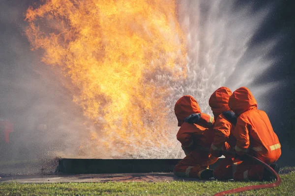 Firefighter Rescue Training Fire Fighting Extinguisher Firefighter Fighting Flame Using — ストック写真