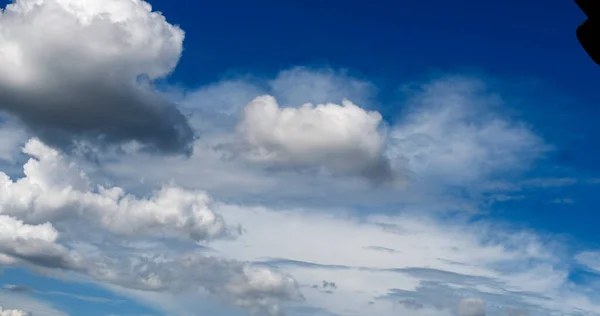 Panorama blue sky clouds pattern on daylight with copy space. Cumulus cloudscape air climate sunny day. Blue sky fluffy white clouds on summer season bright clear skyline with beautiful cloudscape
