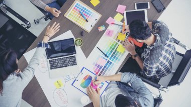 Top view business people meeting together at office desk in conference room. Team business meeting partnership planning brainstorming together. Team Collaborate group of partner company brainstorming