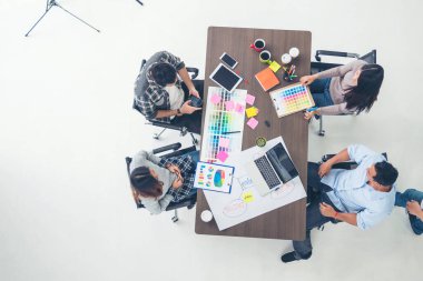 Top view business people meeting together at office desk in conference room. Team business meeting partnership planning brainstorming together. Team Collaborate group of partner company brainstorming