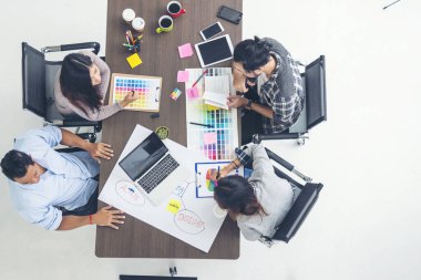 Top view business people meeting together at office desk in conference room. Team business meeting partnership planning brainstorming together. Team Collaborate group of partner company brainstorming