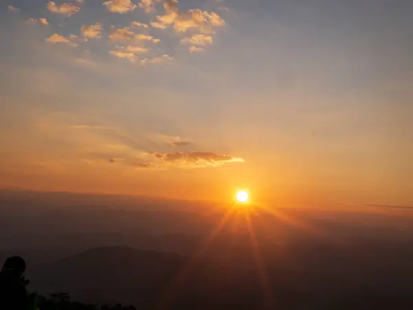 golden sky sunrise dramatic beautiful landscape mountain. Dawn sky gold dusk time cloudscape with sunlight. Dramatic sunset over mountain landscape. Beautiful landscape foggy hills twilight time