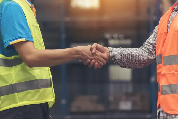 Close Warehouse Worker Shakehand Together Engineer Man Hands Partnership Diversity — Stock Photo, Image
