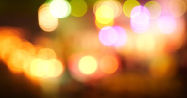 Canlı Bokeh soyut bulanık arka plan müzik festivali sahne performansı partisi. Renkli bokeh arka plan animasyon hareketini ateşliyor. Göz kırpan gece hayatı ile sahne arkası görüntüsü yanıp sönen ışık