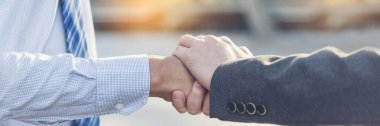 Banner Trust honesty business customer handshake together promise partner. Panorama Businessman teamwork diversity solidarity team Partner hands together. Team meeting shaking hands with copy space