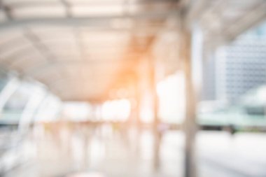 White Blurred background bright restaurant shopping mall Silver gray lighting. defocused store light bokeh in retail shop. Blurry off white Backdrop hospital bright softness hotel with copy space