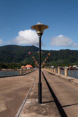 Lamp post on Old Town Koh Lanta pier on a sunny day . Ko Lanta, Krabi, Thailand.