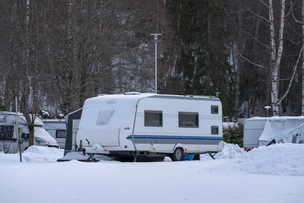 Winter camping, caravan trailer parked in Messila Camping, Hollola, Finland
