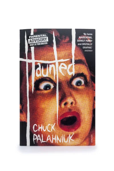 stock image Haunted by Chuck Palahniuk isolated on white background. Lahti, Finland. June 1 2023.