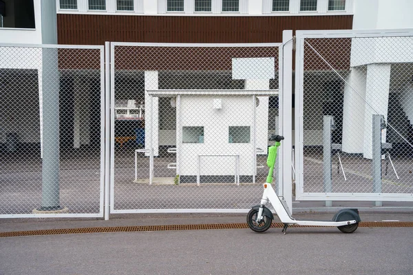 Electric Scooter Parked Stadium Fence — Stock Photo, Image