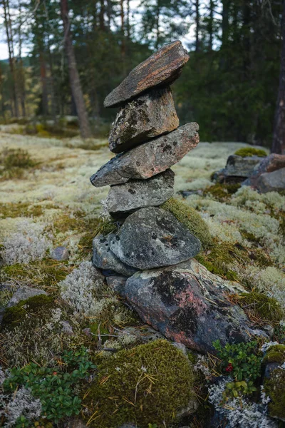 Pile of balanced rocks in a Finnish forest