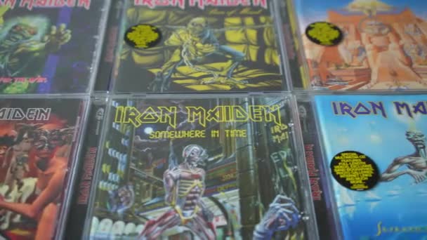 Selection Iron Maiden Cds Moving Camera Close — Stock Video