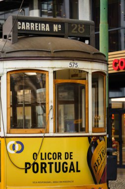 Famous number 28 tram, close up in Lisbon, Portugal. February 1, 2024. clipart