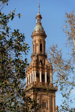 Top part of Torre Sur (south tower) at Plaza de Espana in Seville, Spain. clipart