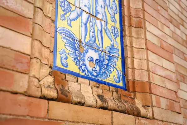 stock image Seville, Spain. February 5, 2024 - Close-up of colorful tilework on a brick wall in plaza de espana