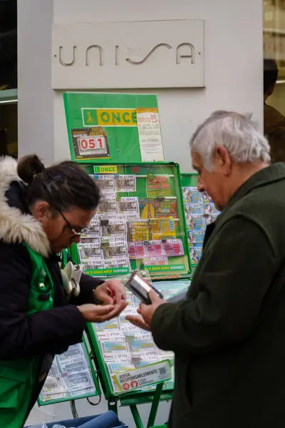 stock image Seville, Spain. February 5, 2024 - ONCE lottery tickets being sold on a street