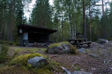 Kirnukangas lean-to shelter and campfire site in Repovesi National Park, Kouvola, Finland.