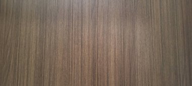 Damarları olan ve soyut ya da kırsal arkaplan olarak kullanılabilen hafif rustik ahşap panel