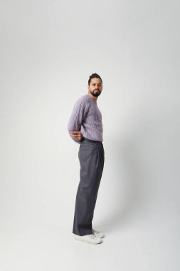 Vertical portrait of casual guy, with curly hair. Mind set and mental health. High quality photo.