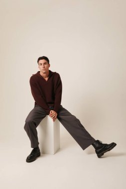 Handsome man with serious expression and ideas, looking at the camera. Mindset. High quality photo.